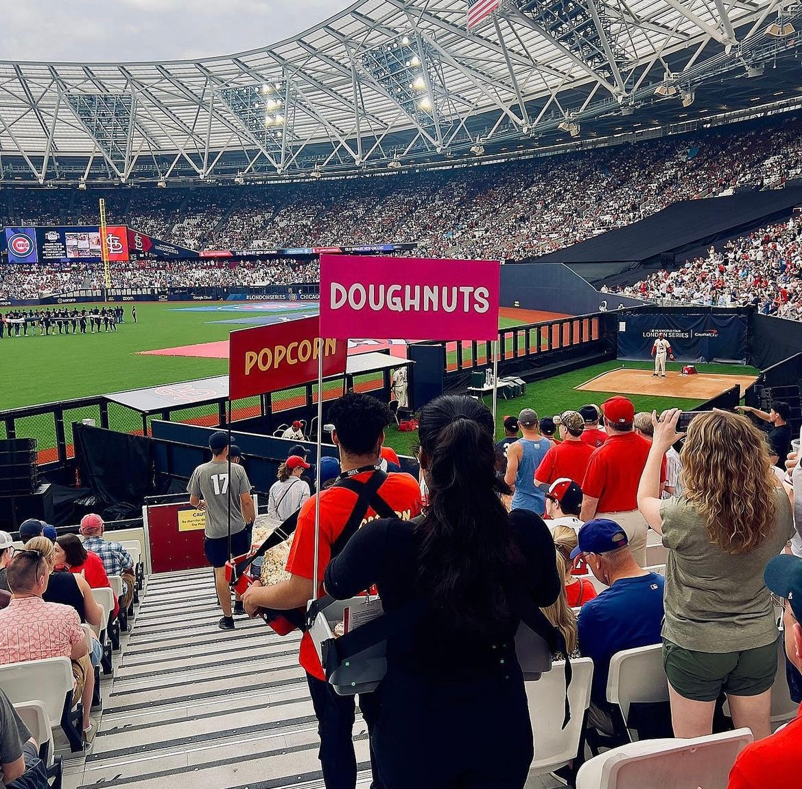 Branded usherette trays at a stadium