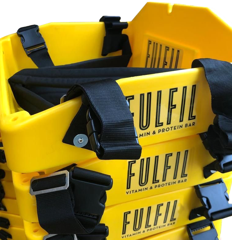 Fulfil custom yellow usherette trays stacked on one another