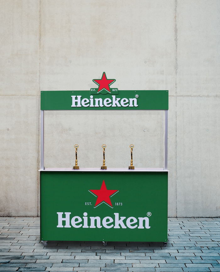 Heineken bar outside against a concrete background